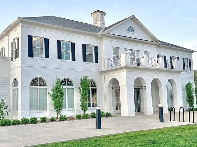 6212 Joes Hopper Rd, Columbus, OH 43230 - rear view of property with brick siding, a balcony, and a patio area