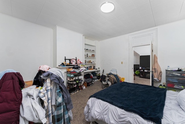 carpeted bedroom with crown molding