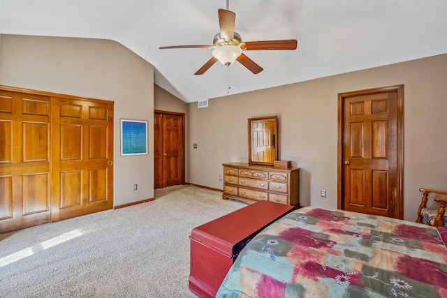 carpeted bedroom with visible vents, baseboards, ceiling fan, and lofted ceiling