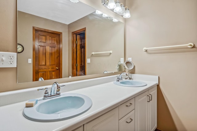 full bath featuring a sink and double vanity
