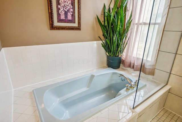full bathroom featuring tiled bath