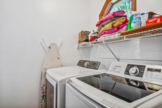 laundry area featuring laundry area and washing machine and clothes dryer