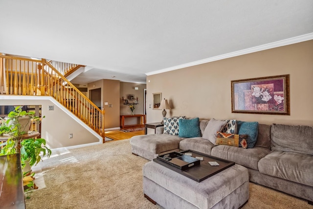 living area with crown molding, carpet flooring, baseboards, and stairway