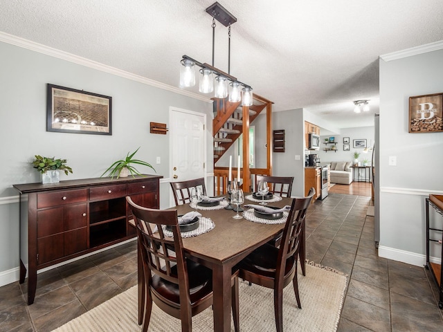 dining room featuring baseboards, ornamental molding, stairs, and a textured ceiling
