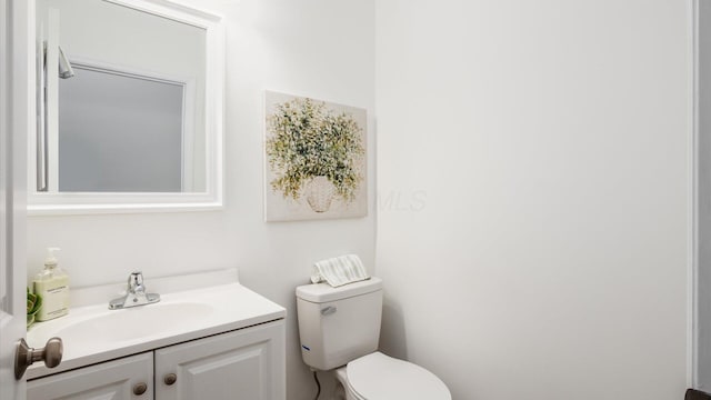half bath with toilet and vanity