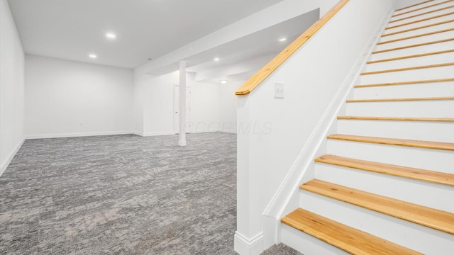 stairs with baseboards, carpet floors, and recessed lighting
