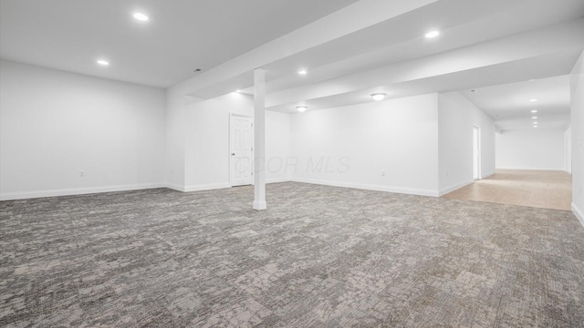 finished basement featuring baseboards, carpet flooring, and recessed lighting