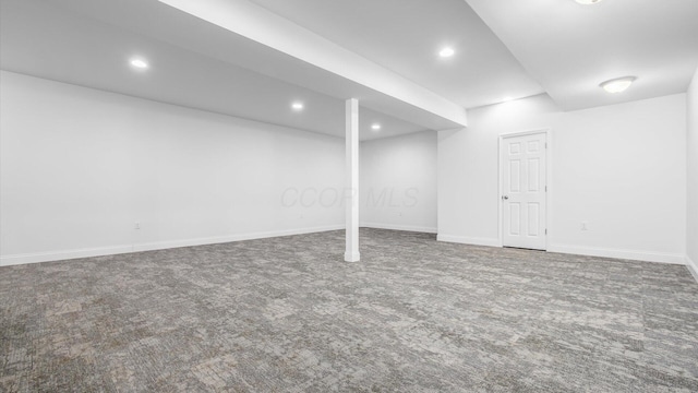 finished basement with recessed lighting, carpet flooring, and baseboards