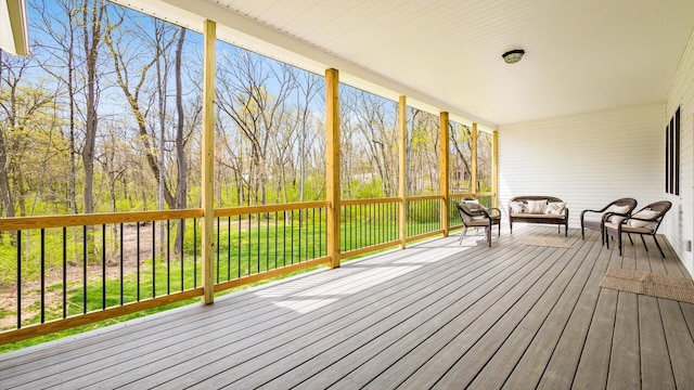 deck with an outdoor hangout area