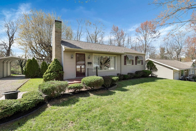 270 Mckinley Ave, New Lexington, OH 43764 - view of front of home with a carport, a chimney, and a front yard