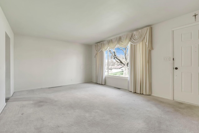 270 Mckinley Ave, New Lexington, OH 43764 - spare room with visible vents and carpet flooring