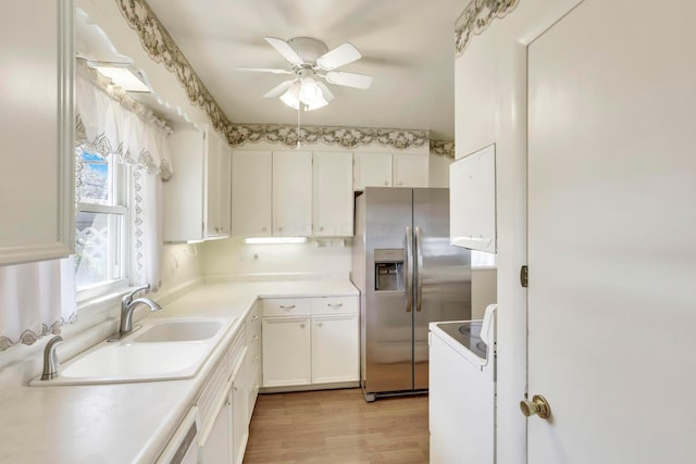 270 Mckinley Ave, New Lexington, OH 43764 - kitchen featuring a sink, light wood-type flooring, white cabinetry, ceiling fan, and stainless steel refrigerator with ice dispenser