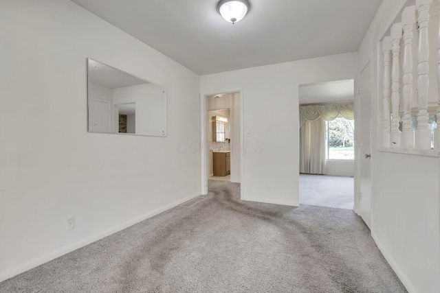 270 Mckinley Ave, New Lexington, OH 43764 - carpeted empty room featuring baseboards