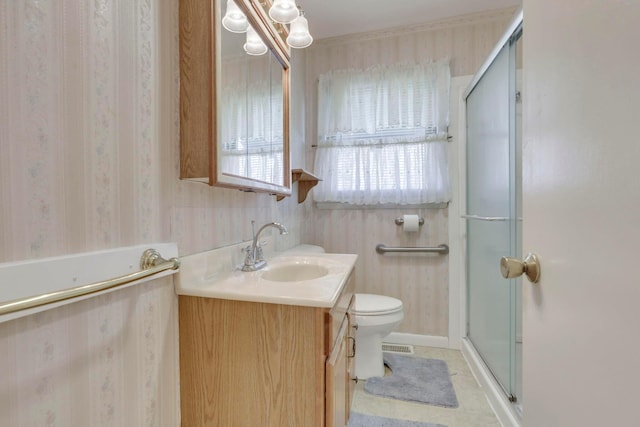 270 Mckinley Ave, New Lexington, OH 43764 - bathroom with wallpapered walls, a stall shower, vanity, toilet, and visible vents