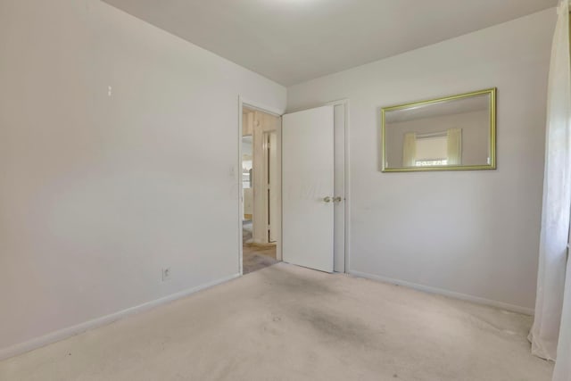 270 Mckinley Ave, New Lexington, OH 43764 - unfurnished bedroom featuring baseboards and carpet