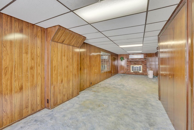 270 Mckinley Ave, New Lexington, OH 43764 - finished basement featuring wooden walls, a fireplace, a wall mounted air conditioner, and carpet floors