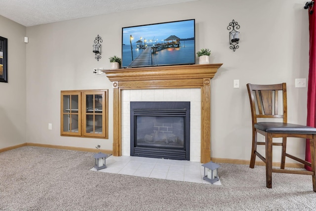 2131 Ripple Rd, Hilliard, OH 43026 - room details with baseboards, carpet, and a tiled fireplace