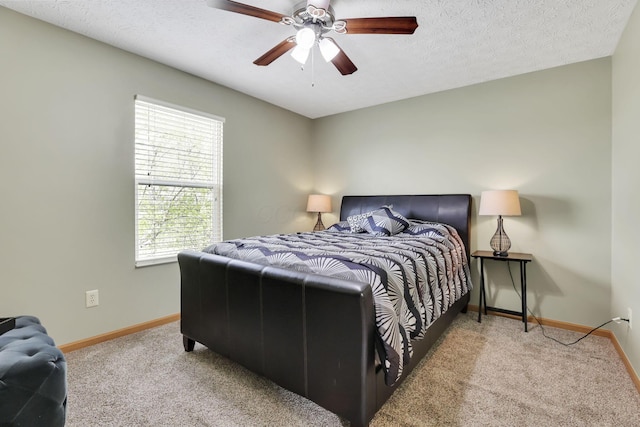 2131 Ripple Rd, Hilliard, OH 43026 - bedroom with baseboards, carpet flooring, a textured ceiling, and ceiling fan