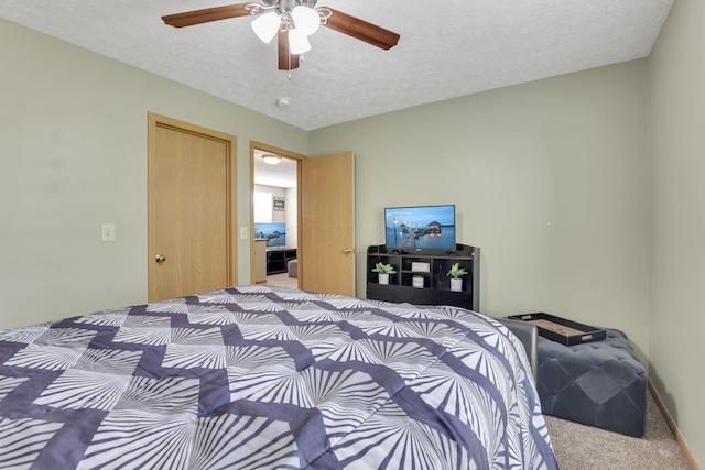 2131 Ripple Rd, Hilliard, OH 43026 - bedroom featuring a closet, carpet flooring, a textured ceiling, and a ceiling fan