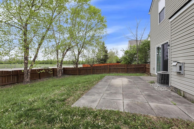 2131 Ripple Rd, Hilliard, OH 43026 - view of yard featuring a fenced backyard, a patio, and central air condition unit