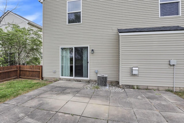 2131 Ripple Rd, Hilliard, OH 43026 - back of house featuring a patio, fence, and central AC unit
