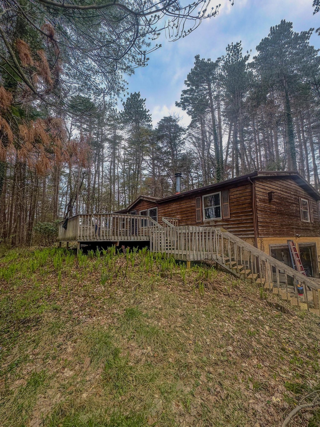 exterior space featuring a wooden deck