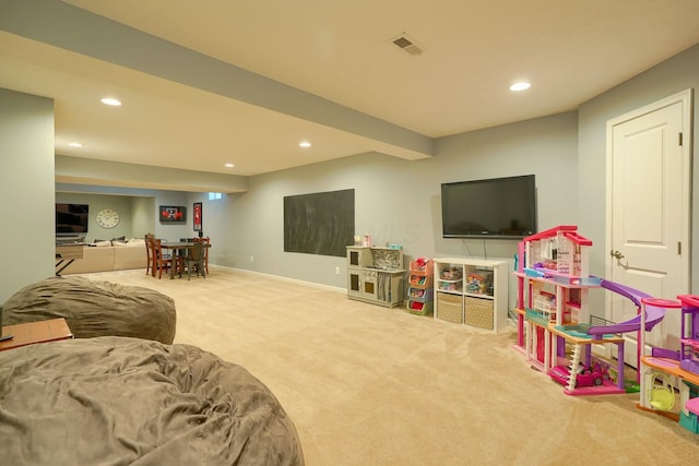 interior space featuring carpet flooring, visible vents, and recessed lighting