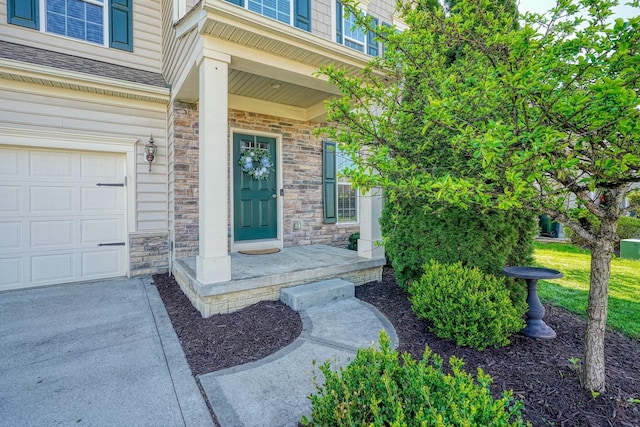 property entrance with stone siding and a garage