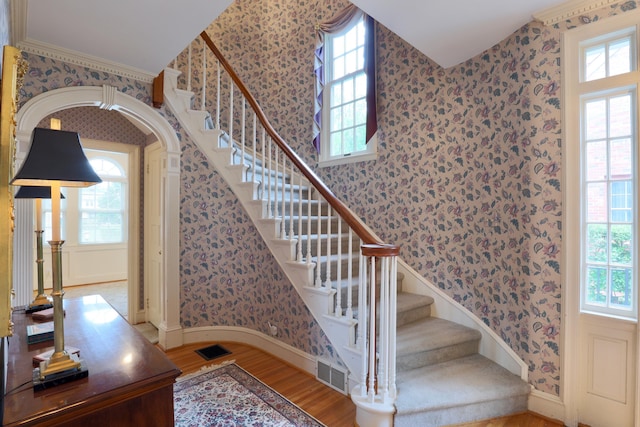 536 E Allen St, Lancaster, OH 43130 - stairway with visible vents, baseboards, wood finished floors, and wallpapered walls