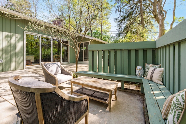 balcony featuring a patio area and an outdoor hangout area
