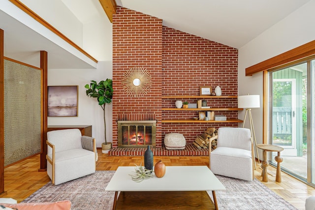 living area featuring a fireplace and high vaulted ceiling