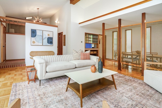 living room featuring an inviting chandelier and vaulted ceiling