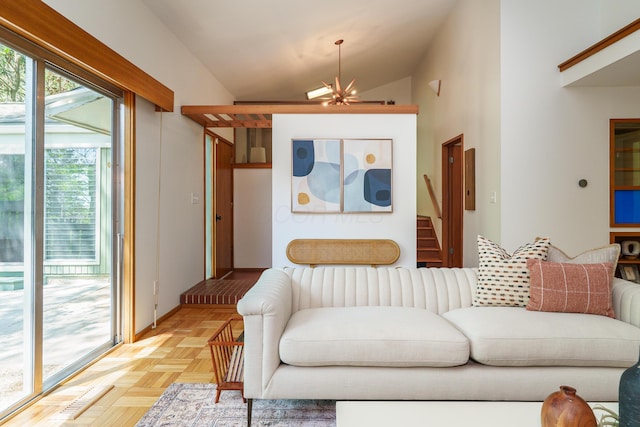 living room featuring stairway and lofted ceiling
