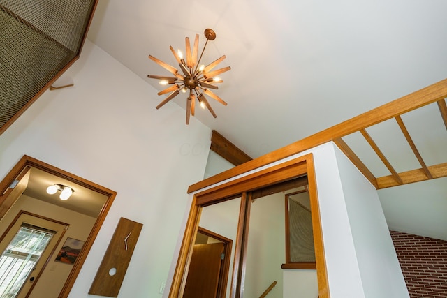 interior details featuring a notable chandelier