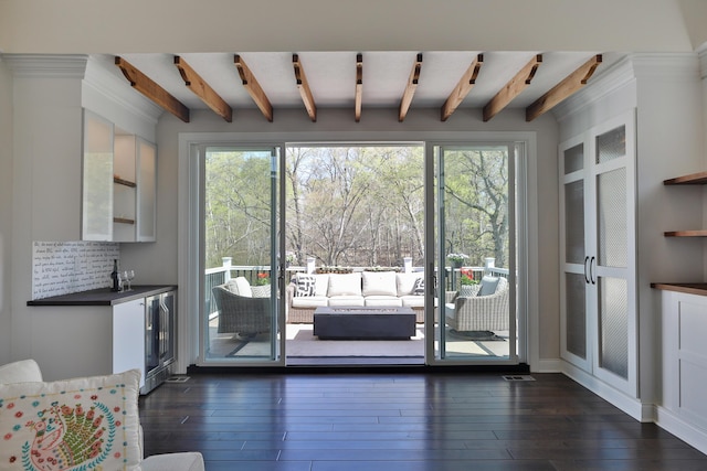 doorway featuring dark wood-style flooring, wine cooler, and plenty of natural light