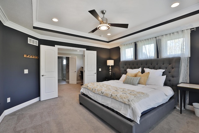 bedroom featuring visible vents, ornamental molding, and light carpet