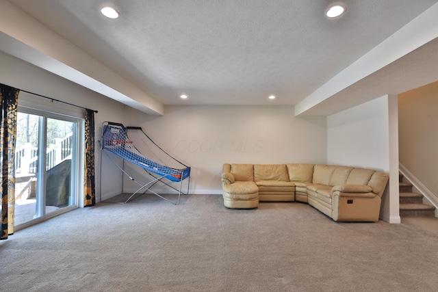living room with recessed lighting, carpet floors, and baseboards