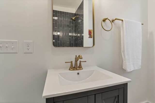 1719 Oak St, Columbus, OH 43205 - bathroom featuring vanity and tiled shower