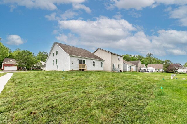 325 Woods Edge Loop, Pataskala, OH 43062 - view of home's exterior featuring a lawn