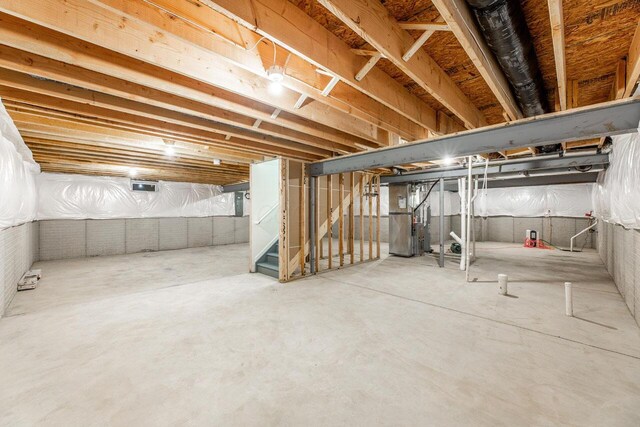 325 Woods Edge Loop, Pataskala, OH 43062 - unfinished basement featuring stairs and heating unit