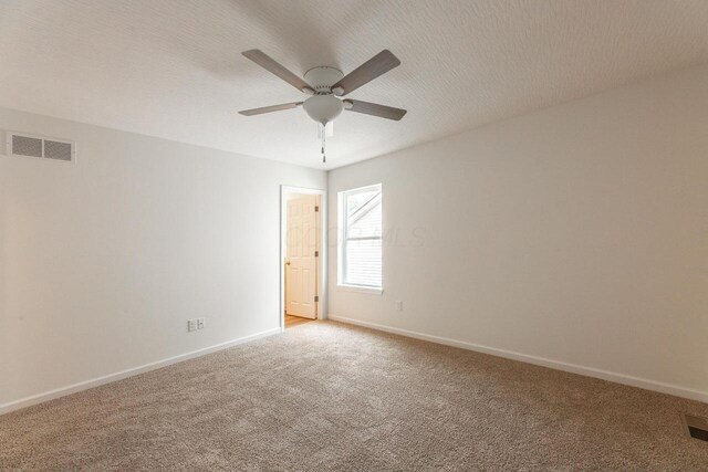 325 Woods Edge Loop, Pataskala, OH 43062 - empty room with ceiling fan, light colored carpet, and baseboards