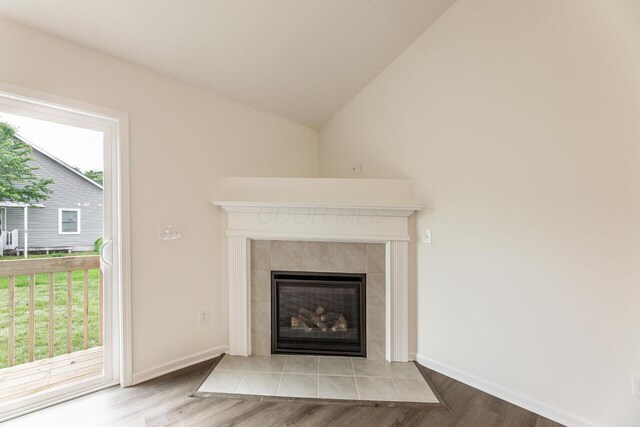 325 Woods Edge Loop, Pataskala, OH 43062 - detailed view of wood finished floors, a tiled fireplace, and baseboards