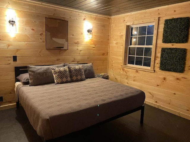 bedroom featuring wooden walls and wood ceiling