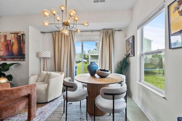 5938 Bears Run Rd, Columbus, OH 43232 - dining space featuring a chandelier and baseboards