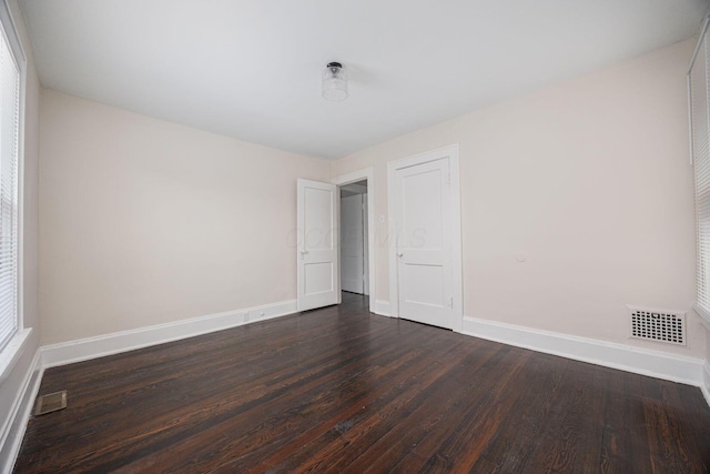 196 E Woodrow Ave, Columbus, OH 43207 - empty room featuring dark wood-style flooring and baseboards