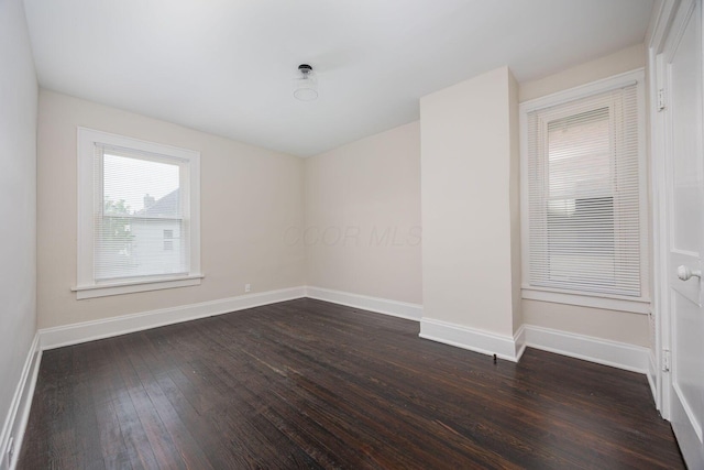 196 E Woodrow Ave, Columbus, OH 43207 - unfurnished room featuring dark wood finished floors and baseboards