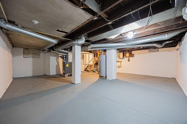196 E Woodrow Ave, Columbus, OH 43207 - unfinished basement with water heater, stairs, and heating unit