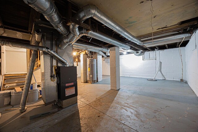 196 E Woodrow Ave, Columbus, OH 43207 - unfinished basement with water heater