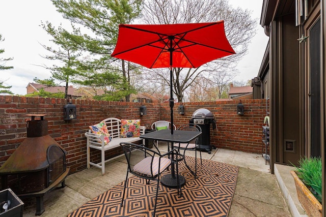 91 Glen Dr, Worthington, OH 43085 - view of patio with grilling area, outdoor dining area, and a fenced backyard