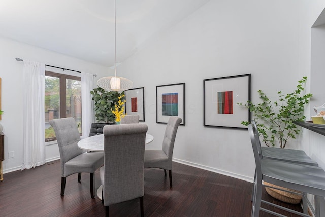 91 Glen Dr, Worthington, OH 43085 - dining space featuring high vaulted ceiling, baseboards, and dark wood-style floors
